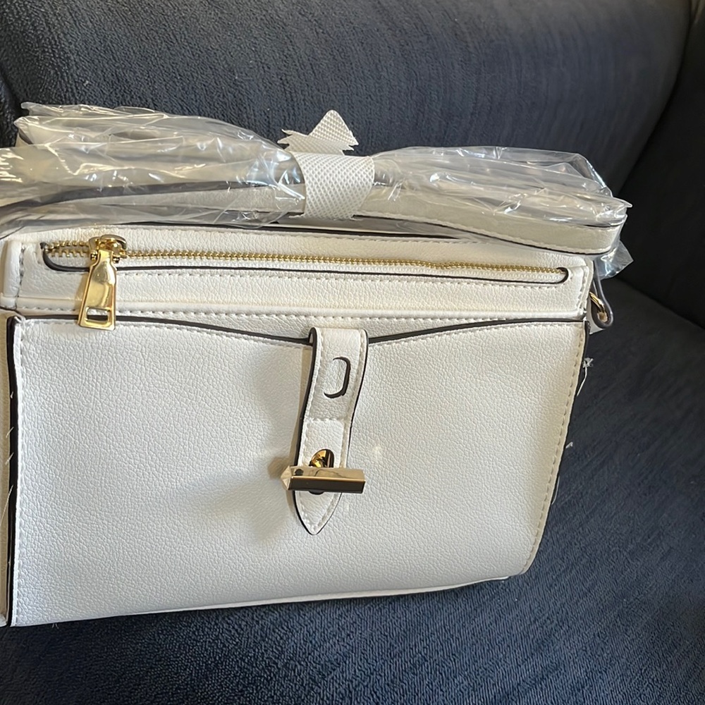 Off white 2 zipper compartments,1 is removable,crossbody